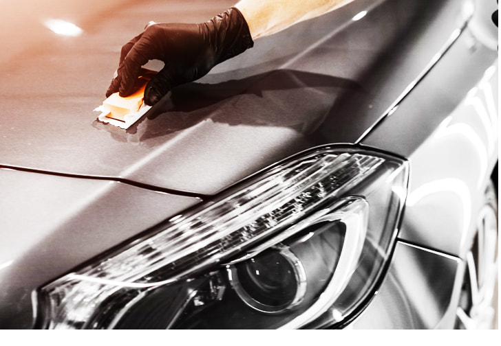 Applying body coating to a car